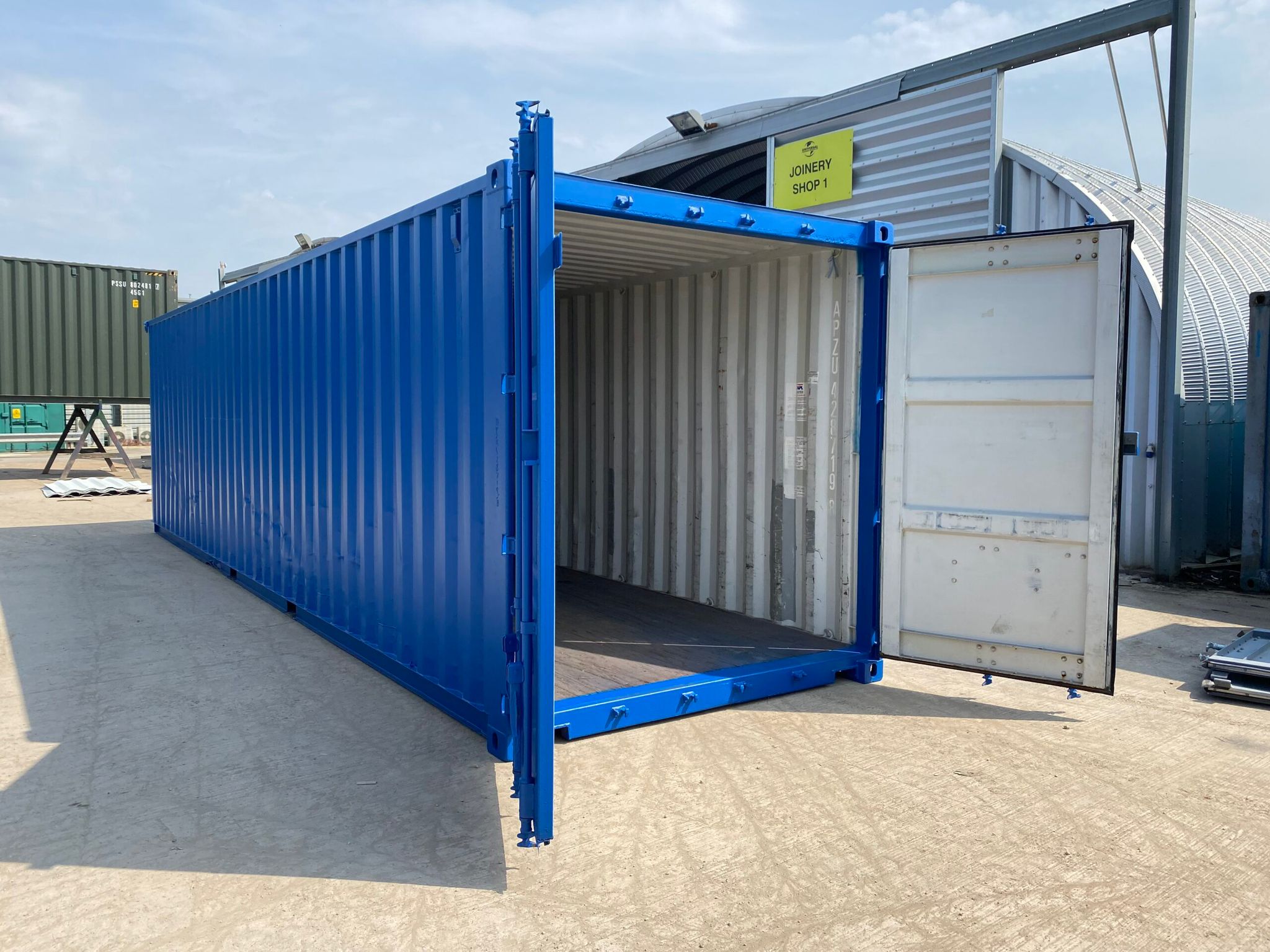 Blue open shipping container